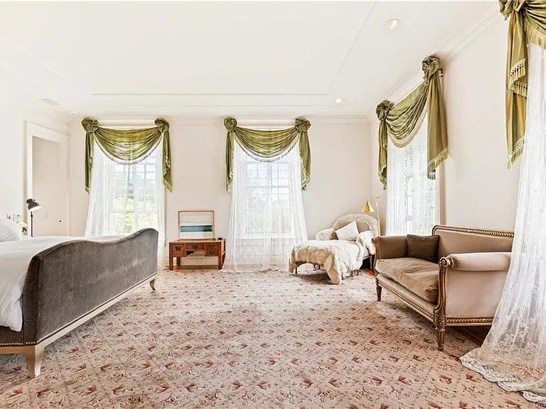 eclectic castle in new york, interior of the Salutation Castle replica with english countryside bedrooms and floral wallpaper