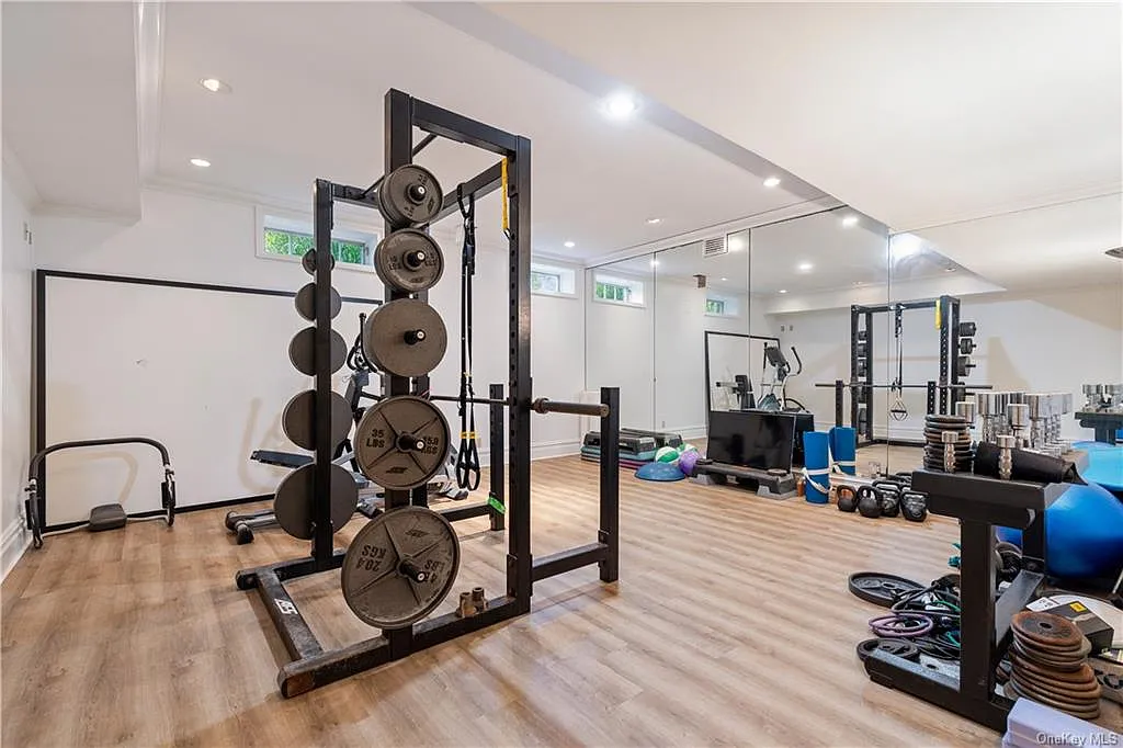 eclectic castle in new york, interior of the Salutation Castle replica with massive private home gym