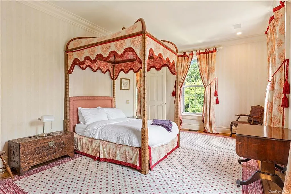 eclectic castle in new york, interior of the Salutation Castle replica with english countryside bedrooms and floral wallpaper