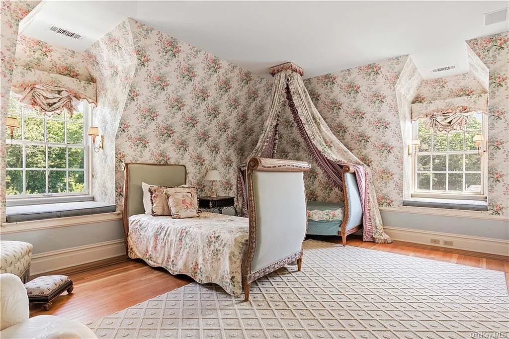 eclectic castle in new york, interior of the Salutation Castle replica with english countryside bedrooms and floral wallpaper