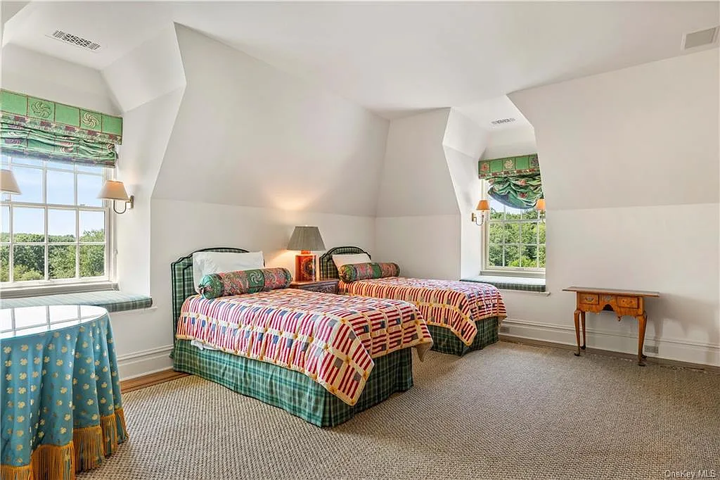 eclectic castle in new york, interior of the Salutation Castle replica with english countryside bedrooms and floral wallpaper