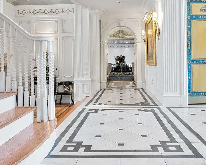 maximalist NJ mansion, 12 The Esplanade in Alpine New Jersey interior marble hallway with mosaic tile