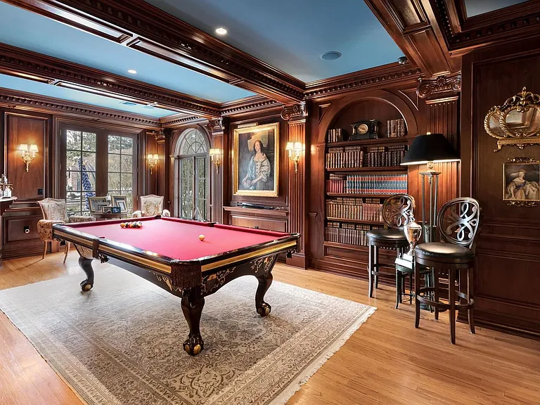 maximalist NJ mansion, 12 The Esplanade in Alpine New Jersey interior billiards room with wood paneling and high ceilings