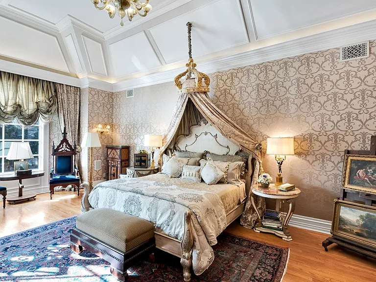 maximalist NJ mansion, 12 The Esplanade in Alpine New Jersey interior master bedroom with massive tray ceilings and canopy bed