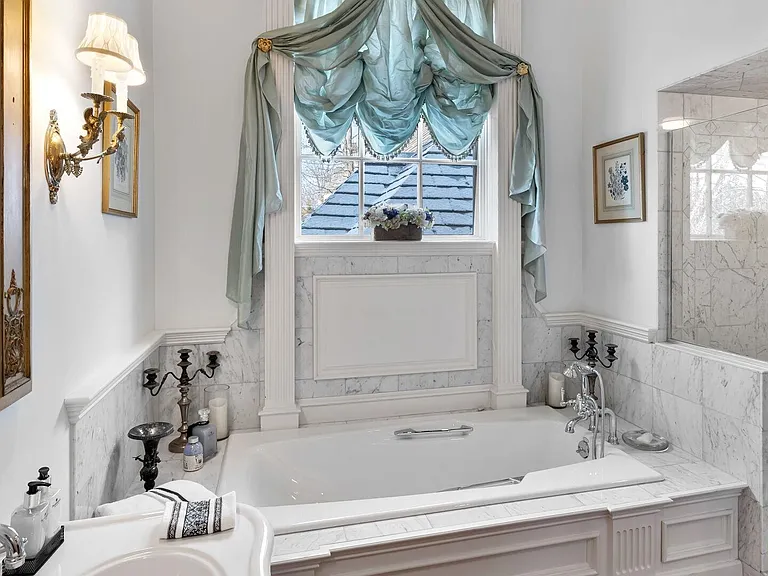 maximalist NJ mansion, 12 The Esplanade in Alpine New Jersey interior master bathroom with marble soaking tub