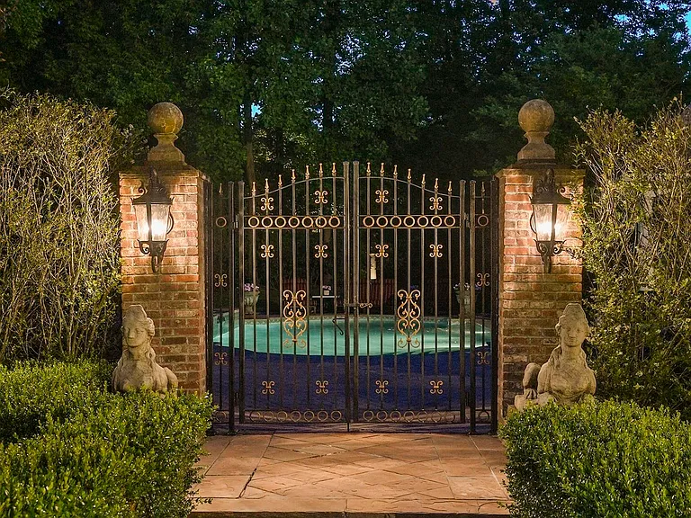 maximalist NJ mansion, 12 The Esplanade in Alpine New Jersey exterior gated in ground pool area