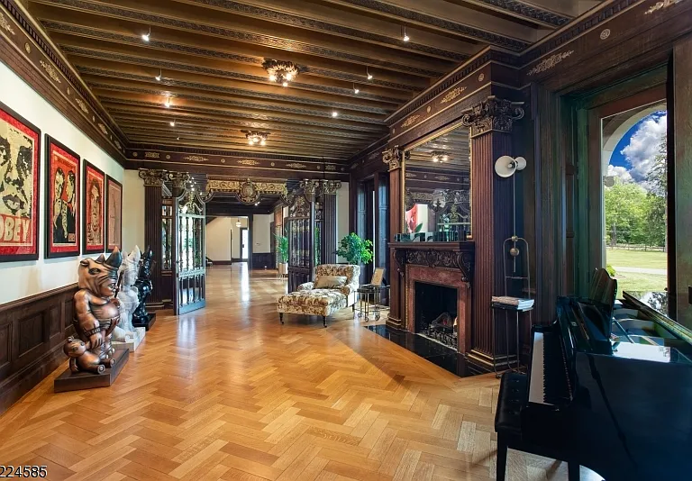 19th-Century Castle in New Jersey, exterior of a massive stone castle in Bernardsville NJ with massive living space and wood paneled walls and ceilings