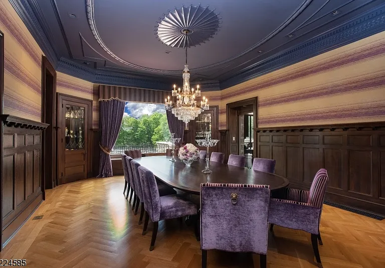 19th-Century Castle in New Jersey, exterior of a massive stone castle in Bernardsville NJ with a large dining room and hand-painted tray ceiling