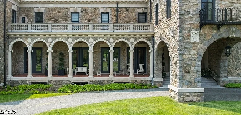 19th-Century Castle in New Jersey, exterior of a massive stone castle in Bernardsville NJ with gargoyles built into the stone