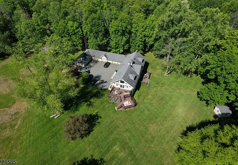 19th-Century Castle in New Jersey, exterior of a massive stone castle in Bernardsville NJ with a large carriage house and guest space