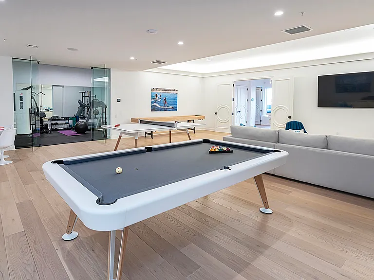 Jersey Shore Beachfront Mansion, beachy modern interior with a home game and billiards room