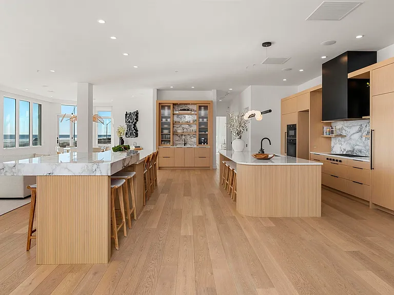 Jersey Shore Beachfront Mansion, beachy modern interior with an imported marble open kitchen design