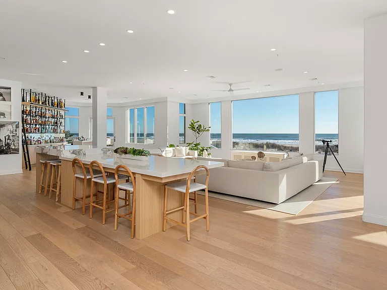 Jersey Shore Beachfront Mansion, beachy modern interior with an imported marble open kitchen design