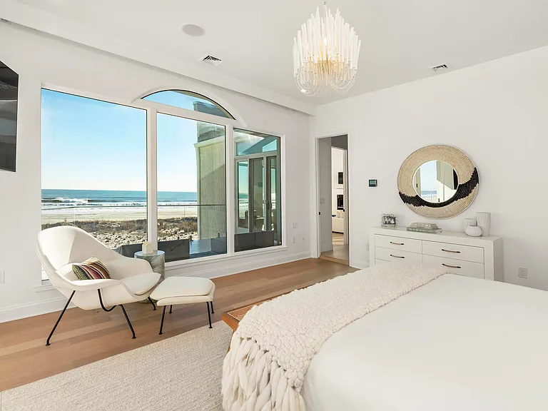 Jersey Shore Beachfront Mansion, beachy modern interior with a guest bedroom overlooking the atlantic ocean