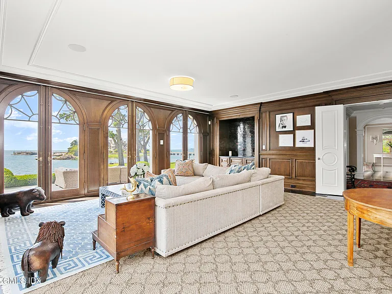 most expensive home in Connecticut, Greenwich mansion interior with wood paneled den overlooking the long island sound