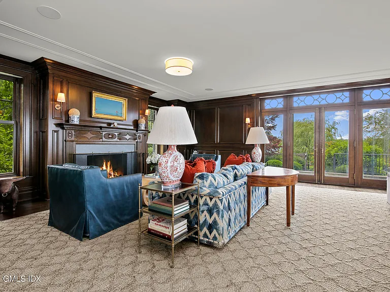 most expensive home in Connecticut, Greenwich mansion interior with wood paneled den overlooking the long island sound