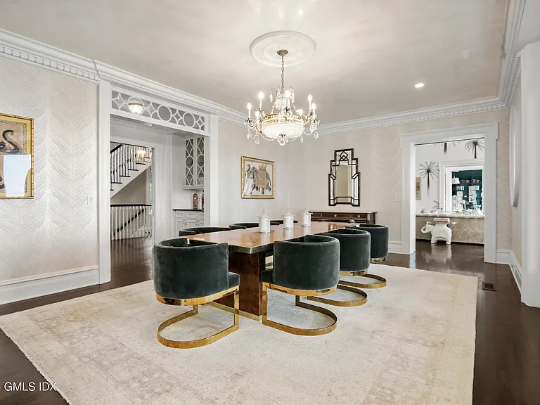 most expensive home in Connecticut, Greenwich mansion interior with modern classic interior dining room with velvet seating