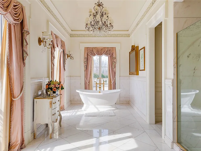 Maximalist Old Brookville Mansion in baroque style, interior of 24 private road in old brookville in nassau county with massive baroque style pink master bathroom