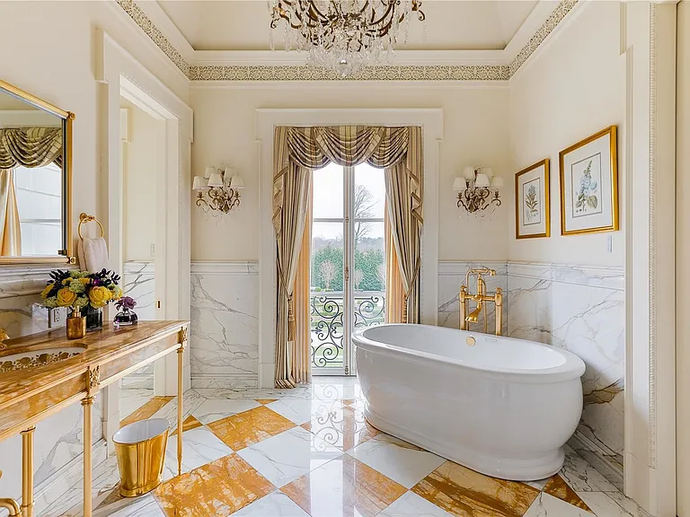 Maximalist Old Brookville Mansion in baroque style, interior of 24 private road in old brookville in nassau county with massive baroque style pink master bathroom