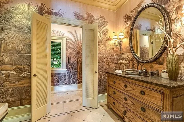 interior of a posh modern saddle river mansion in New Jersey's Bergen County, large tropical bathroom