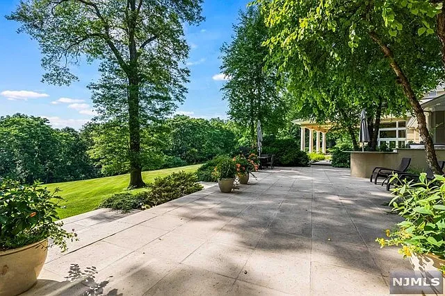 exterior of a posh modern saddle river mansion in New Jersey's Bergen County