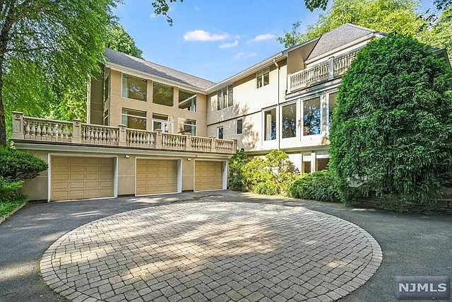 exterior of a posh modern saddle river mansion in New Jersey's Bergen County