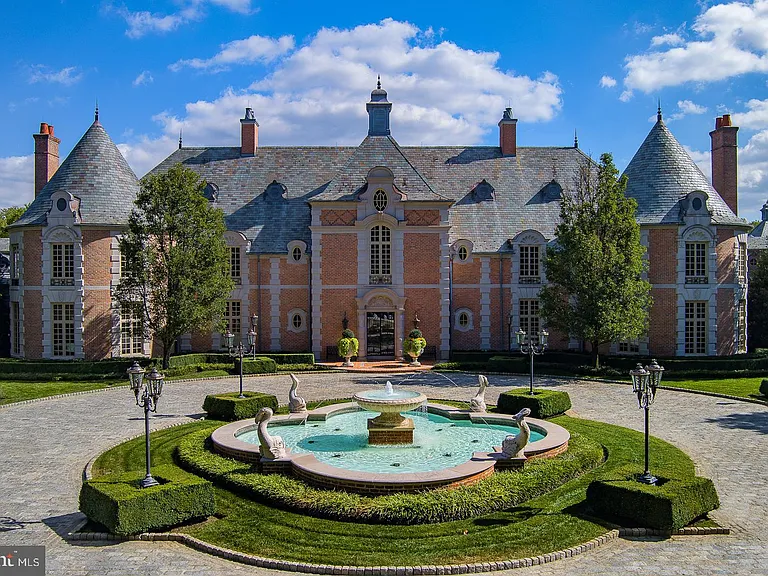 Massive fairytale Pennsylvania Castle in Gladwyne, stone exterior featuring a round driveway