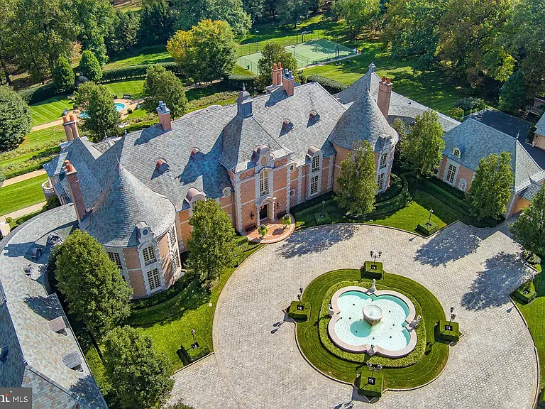 Massive Pennsylvania Castle in Gladwyne, stone exterior featuring a round driveway