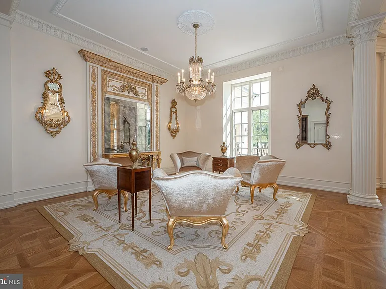 Massive Pennsylvania Castle in Gladwyne, formal living room and seating area with classic velvet furniture and gilded details