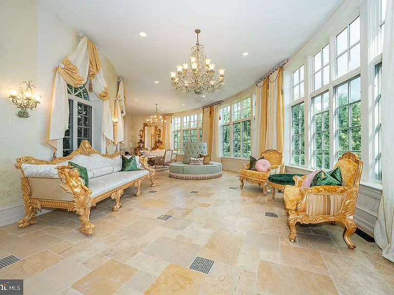 Massive Pennsylvania Castle in Gladwyne, formal living room and seating area with classic velvet furniture and gilded details