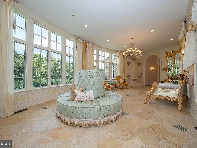 Massive Pennsylvania Castle in Gladwyne, formal living room and seating area with classic velvet furniture and gilded details