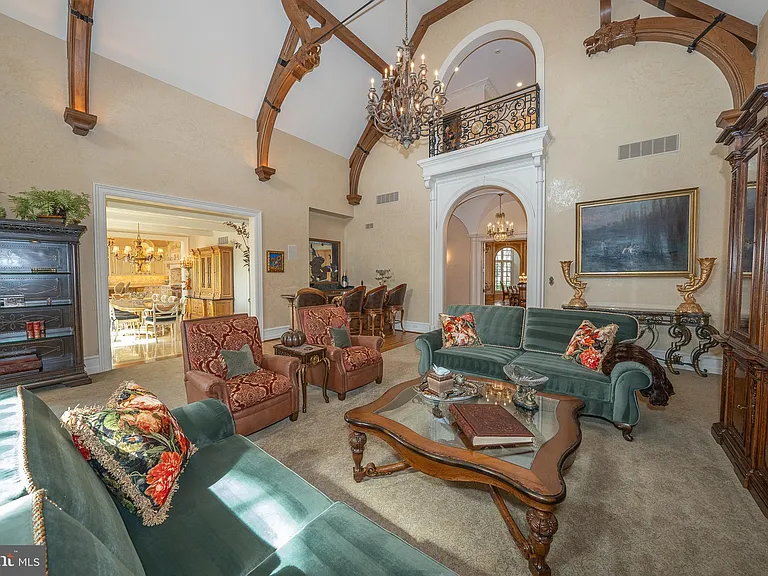 Massive Pennsylvania Castle in Gladwyne, massive den and living room with vaulted ceilings and tudor style beams