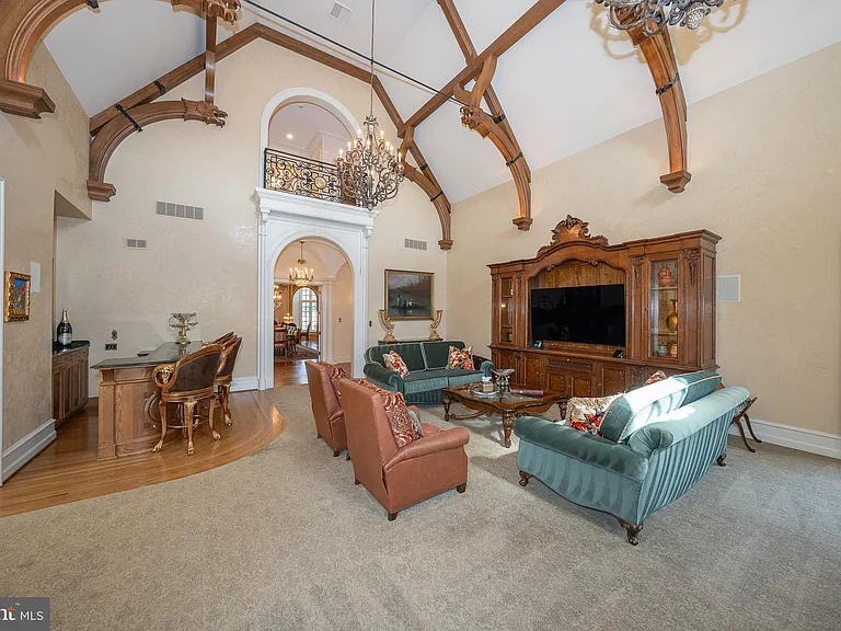 Massive Pennsylvania Castle in Gladwyne, massive den and living room with vaulted ceilings and tudor style beams