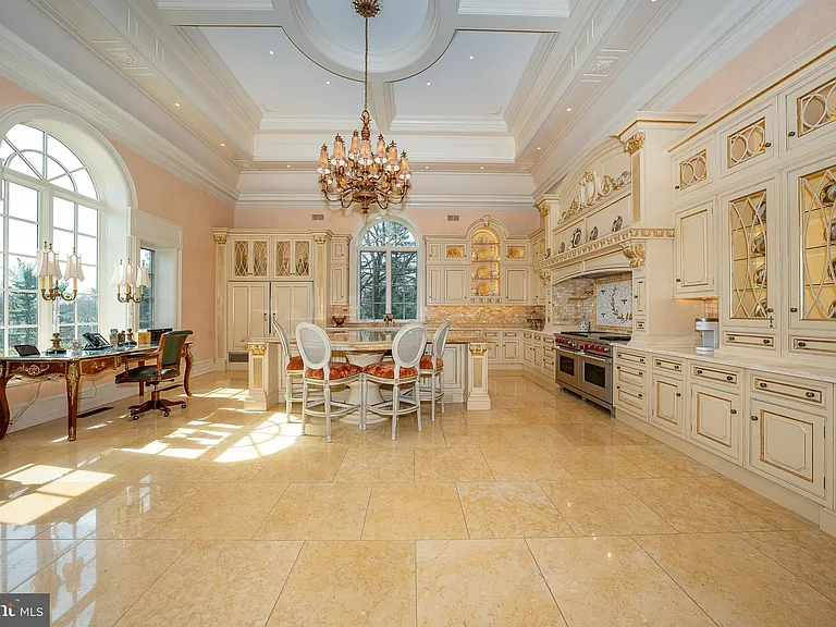 Massive Pennsylvania Castle in Gladwyne, massive cream marble kitchen with tuscan and french countryside details