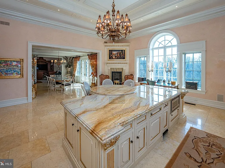 Massive Pennsylvania Castle in Gladwyne, massive cream marble kitchen with tuscan and french countryside details