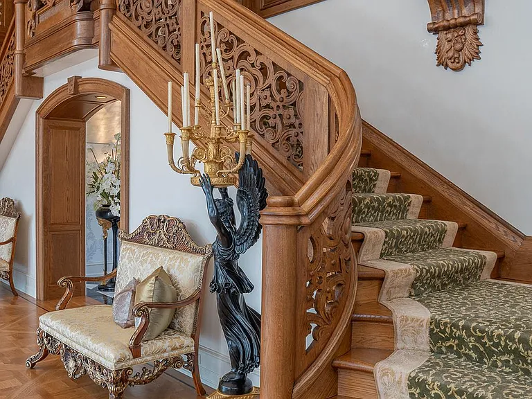 Massive Pennsylvania Castle in Gladwyne, massive hardwood foyer with crystal chandelier and spiral staircase