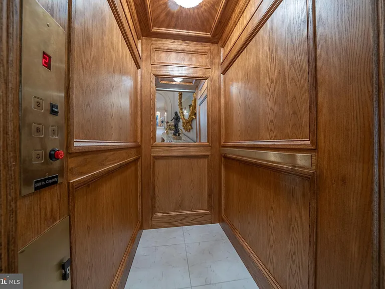 Massive Pennsylvania Castle in Gladwyne, private elevator with oak wood paneling