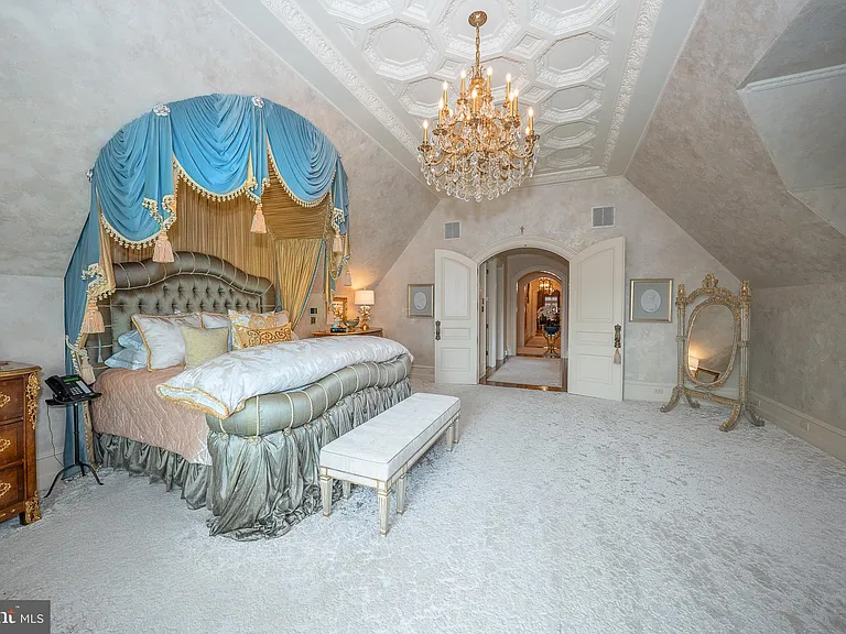 Massive Pennsylvania Castle in Gladwyne, massive master bedroom with crystal chandelier and custom ceilings