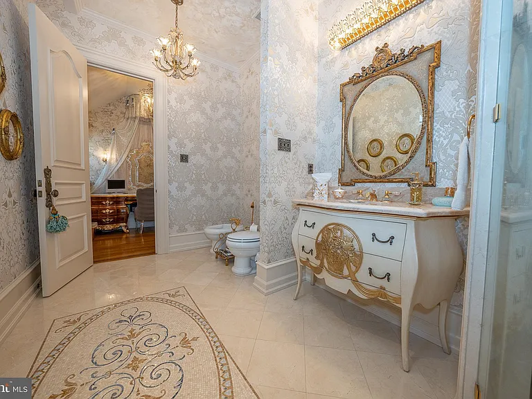 Massive Pennsylvania Castle in Gladwyne, massive master bathroom with gilded vanity and mirrors