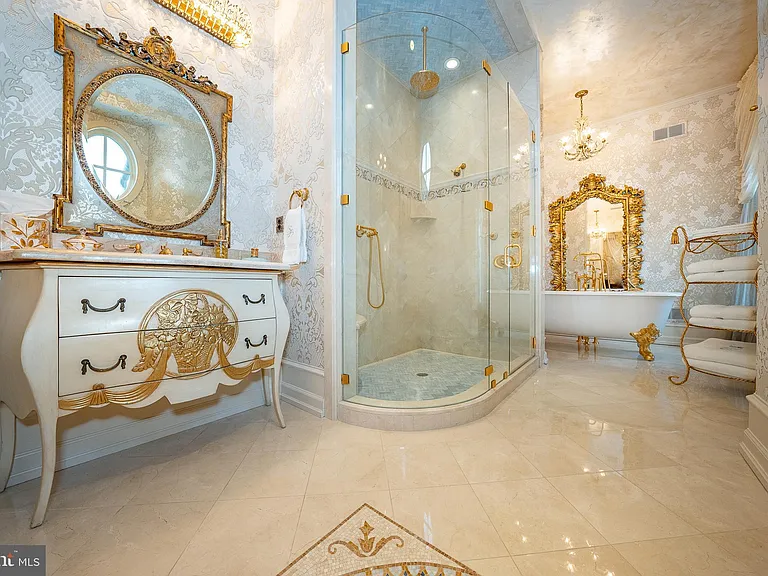 Massive Pennsylvania Castle in Gladwyne, massive master bathroom with gilded vanity and mirrors