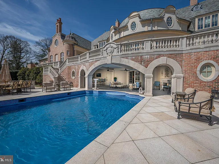 Massive fairytale Pennsylvania Castle in Gladwyne, stone exterior featuring a round driveway