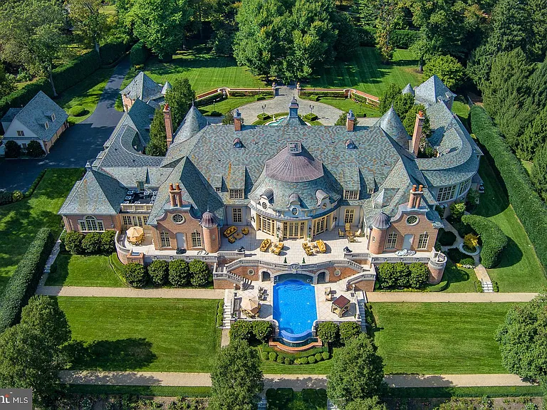 Massive fairytale Pennsylvania Castle in Gladwyne, stone exterior featuring a round driveway