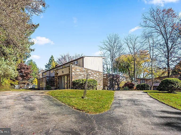 Philly home of boxer Muhammad Ali and family, midcentury modern home exterior in Morris Park Philadelphia