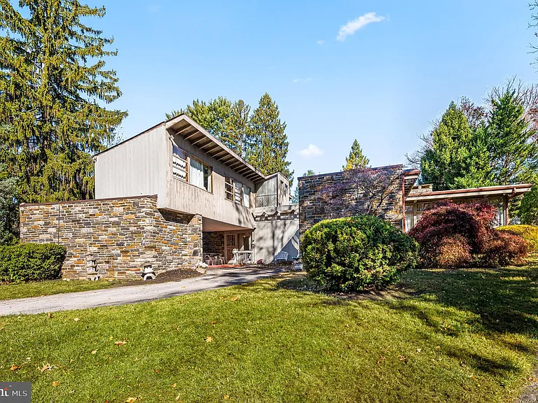 Philly home of boxer Muhammad Ali and family, midcentury modern home exterior in Morris Park Philadelphia