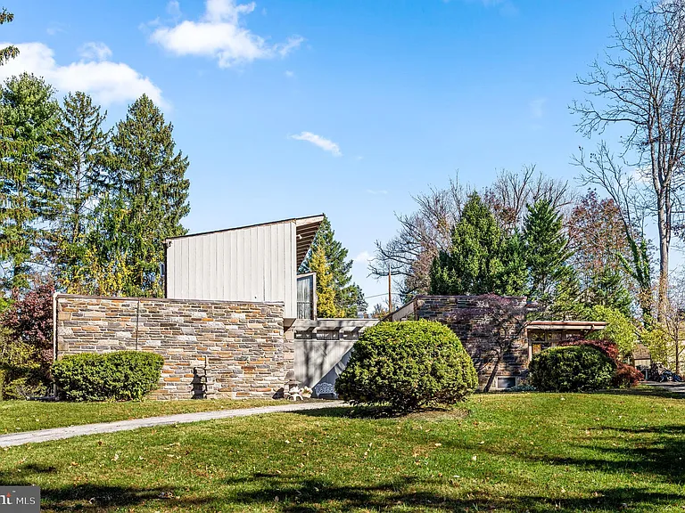 Philly home of boxer Muhammad Ali and family, midcentury modern home exterior in Morris Park Philadelphia