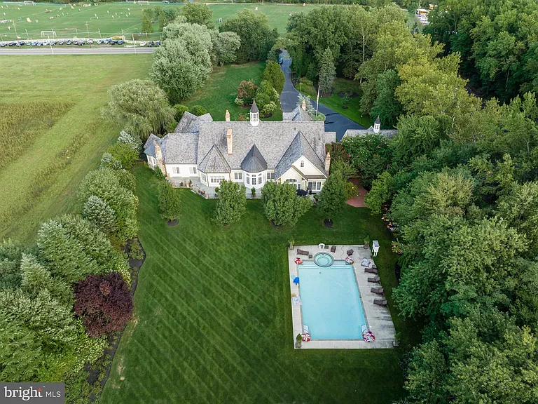 Classic NJ mansion in Moorestown New Jersey, exterior full view of property and in-ground pool