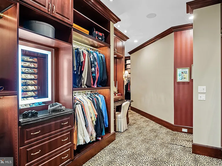 Classic NJ mansion in Moorestown New Jersey, dark wood master bedroom walk-in closet