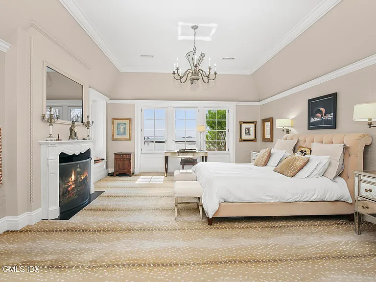 Massive Long Island Sound Mansion, interior of Cedarcliff Road in Riverside Connecticut with light and airy master bedroom with views of the Long Island Sound