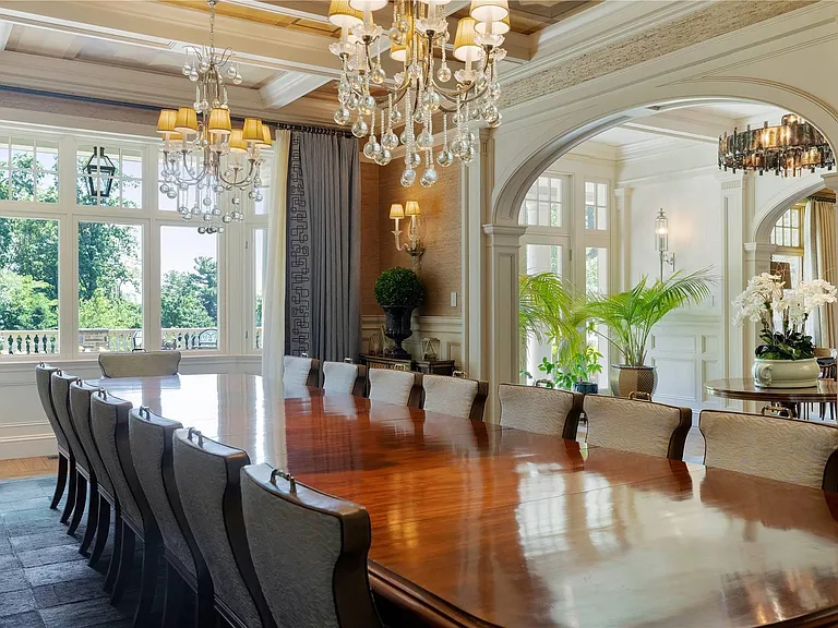 Old Westbury Mansion, exterior of Spring Hill Lane estate with a giant 18-person dining table in a modern dining hall