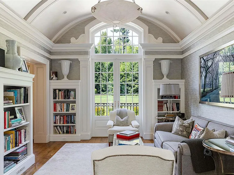 Old Westbury Mansion, exterior of Spring Hill Lane estate with white seating area with domed ceilings